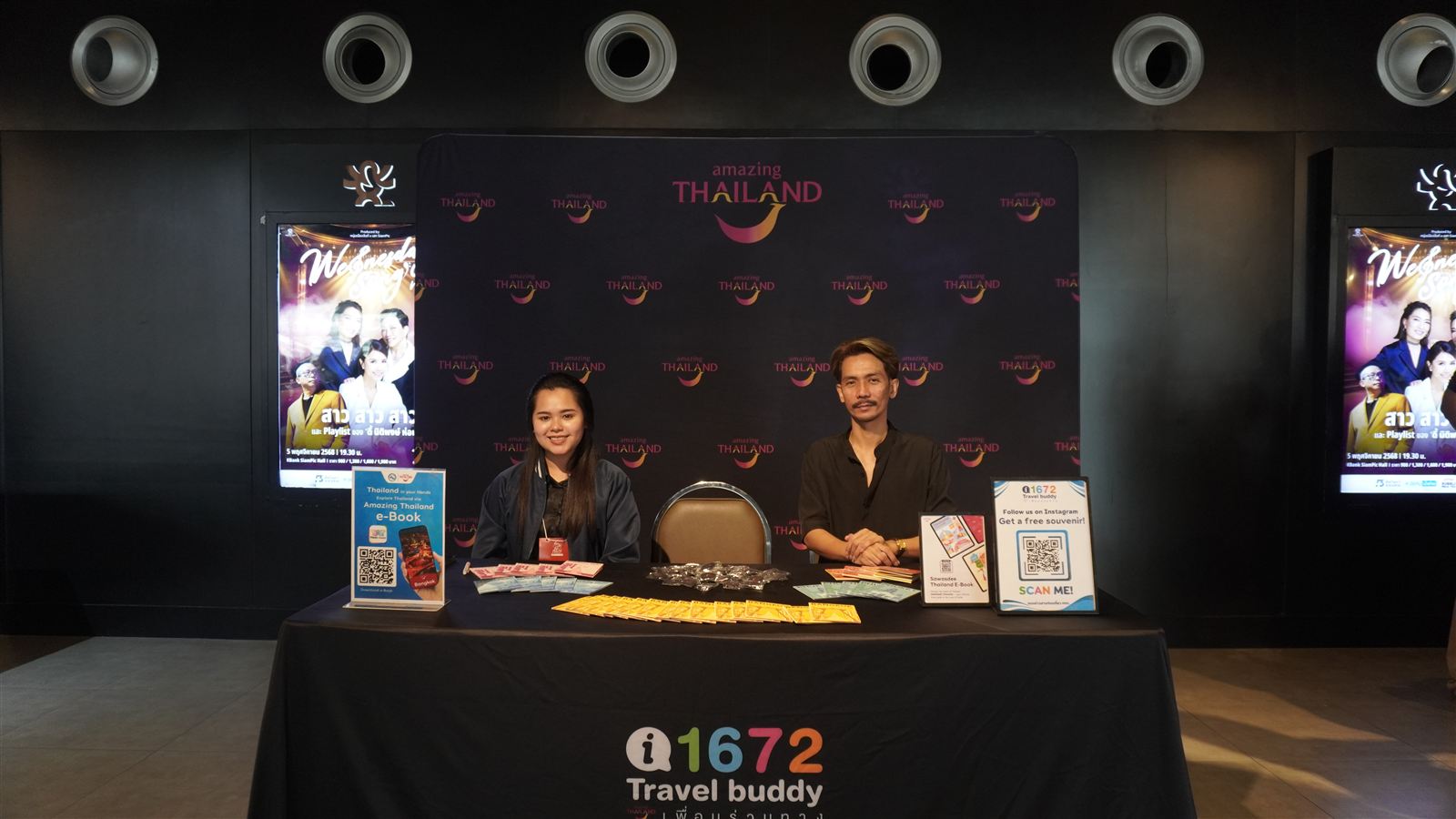 The Amazing Thailand booth handing out souvenirs to guests